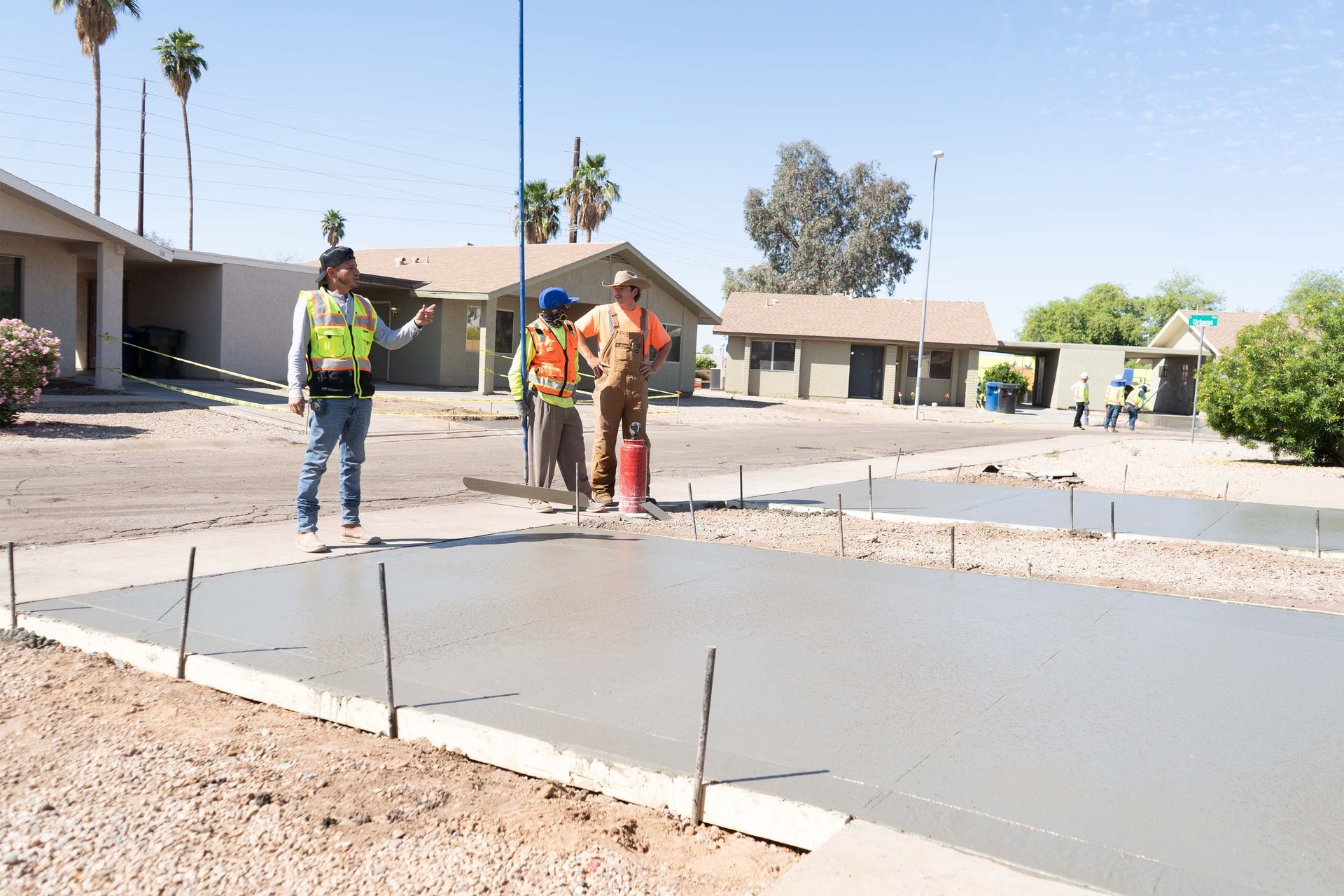 A concrete foundation is being built in a residential area.