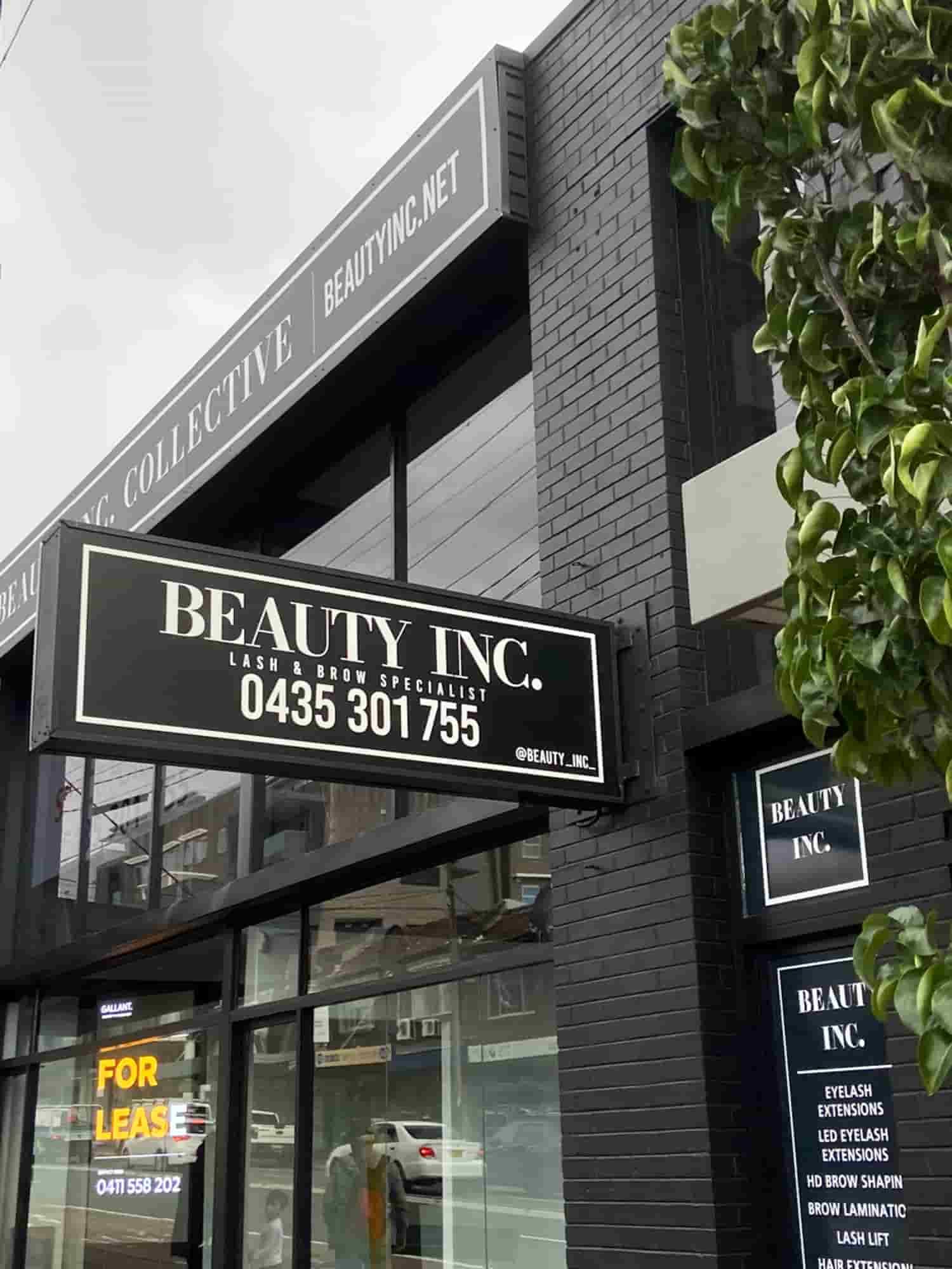 A Building With A Sign That Says Beauty Inc On It  — Solis Signs in Toukley, NSW