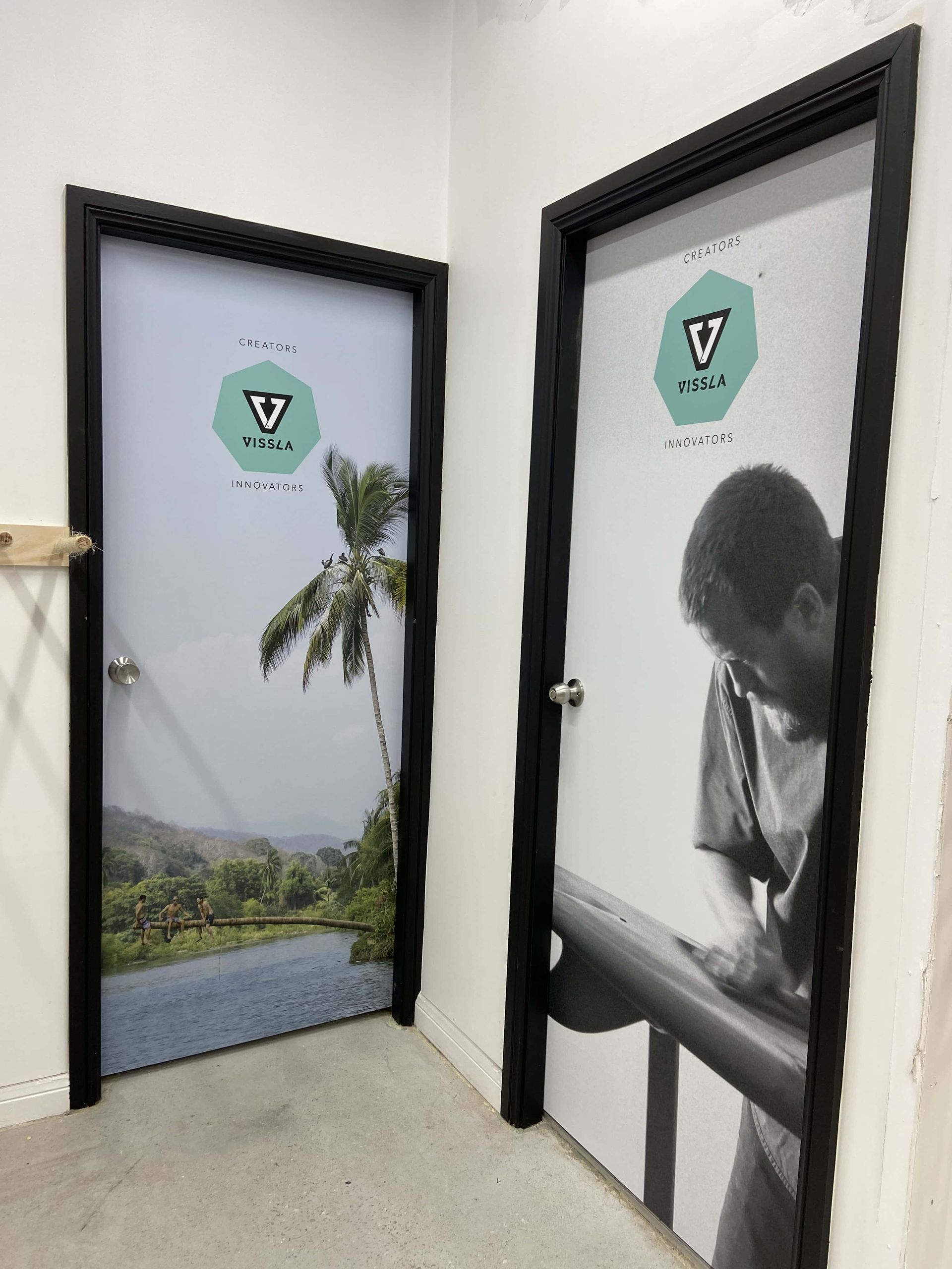 Two doors with a picture of signage — Solis Signs in Toukley, NSW