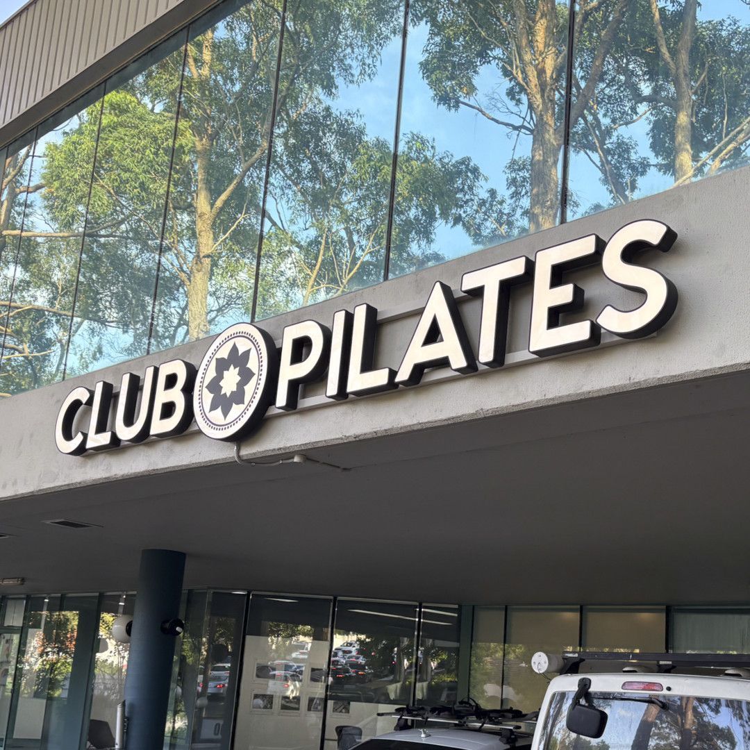 A Store Front With A Sign That Says Club Pilates — Solis Signs in Toukley, NSW