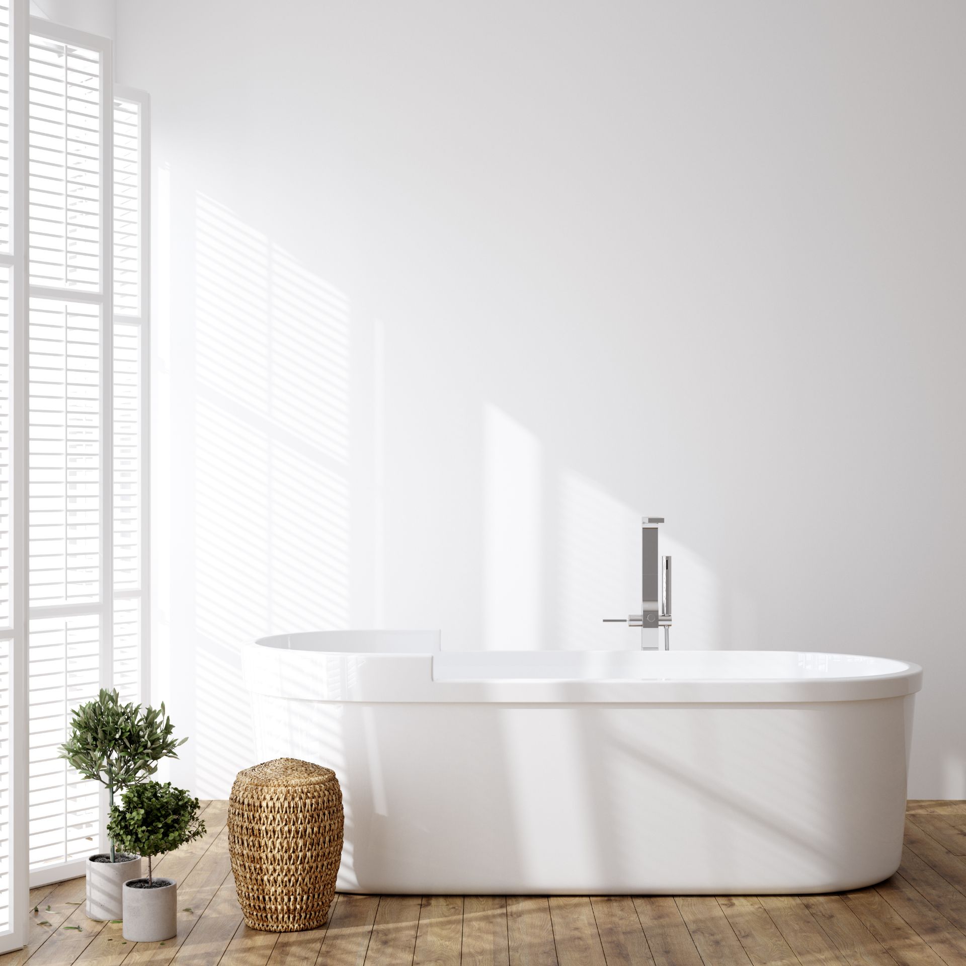 Bathroom with white tub and wood floor