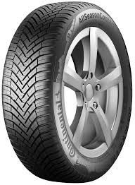 A close up of a tire on a wheel on a white background.