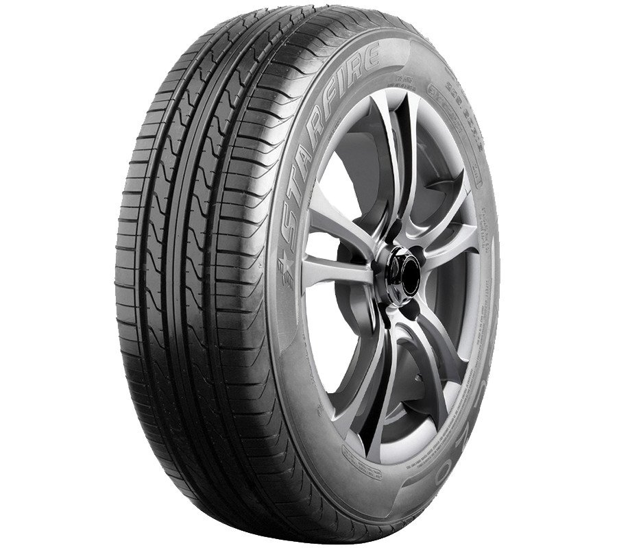 A close up of a car tire on a wheel on a white background.