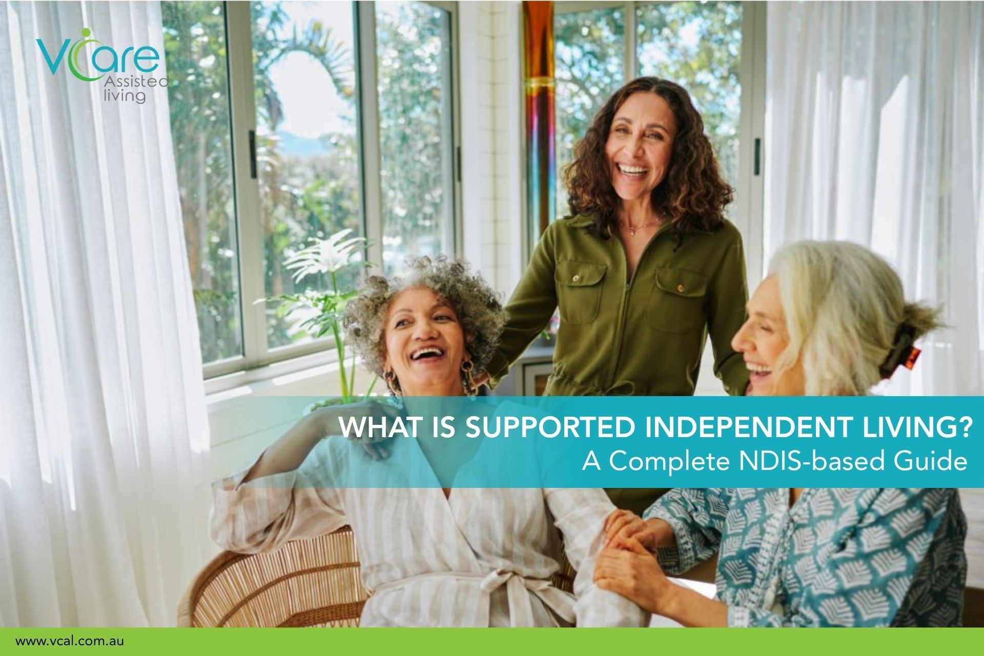 Three smiling women in bathrobes sitting and standing together in a bright, plant-filled living room, illustrating V Care Assisted Living's guide on Supported Independent Living under the NDIS.