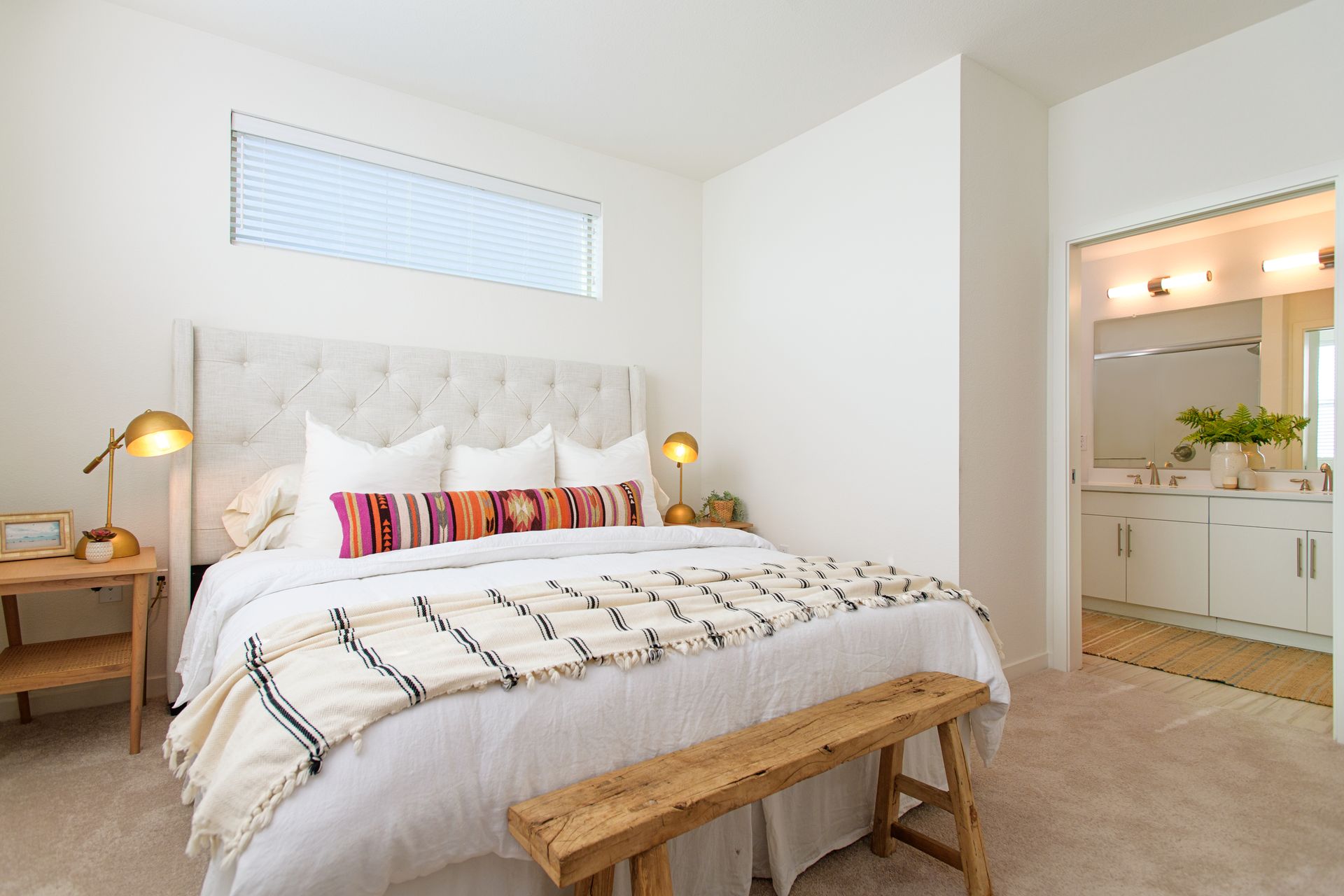 photo showing a master bedroom with plenty of natural lighting
