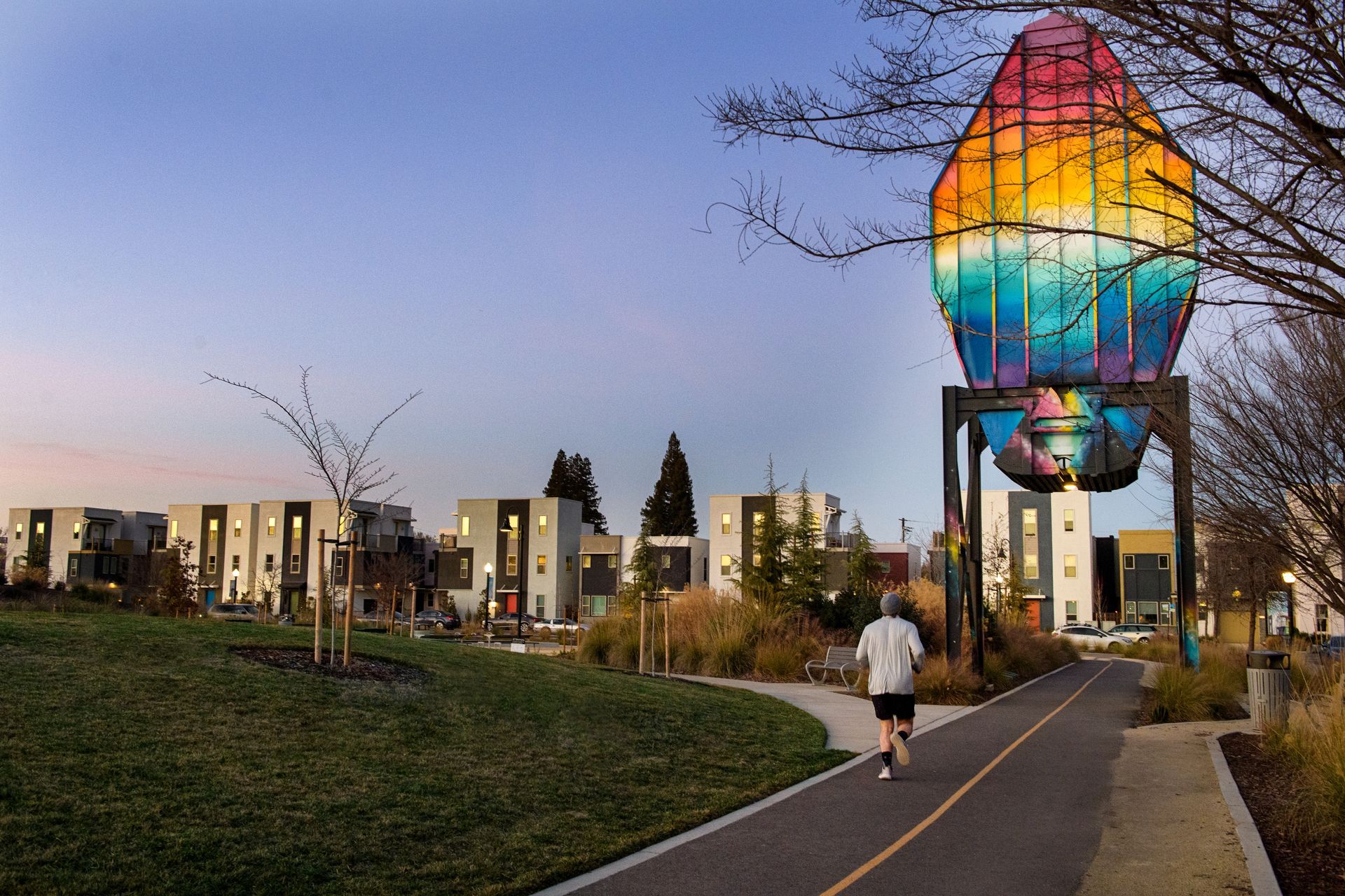 photo showing artwork above the walkway/bike path nearby