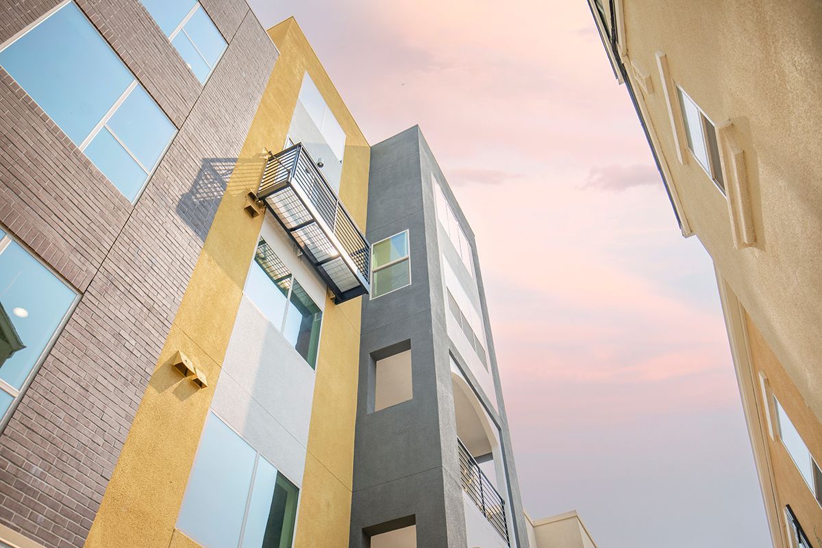 photo looking up at the building around sunset