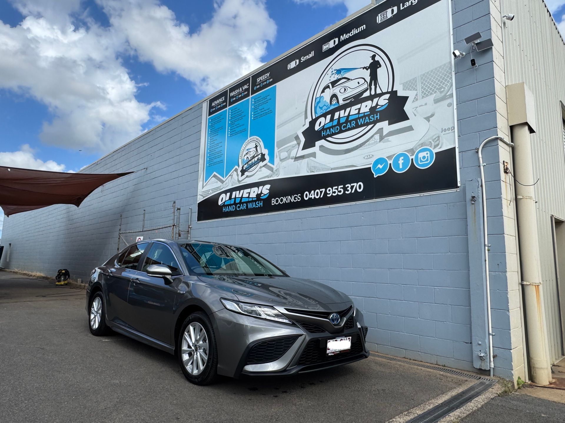 Worker Cleaning Car Seats — Hand Car Wash in Norville, QLD