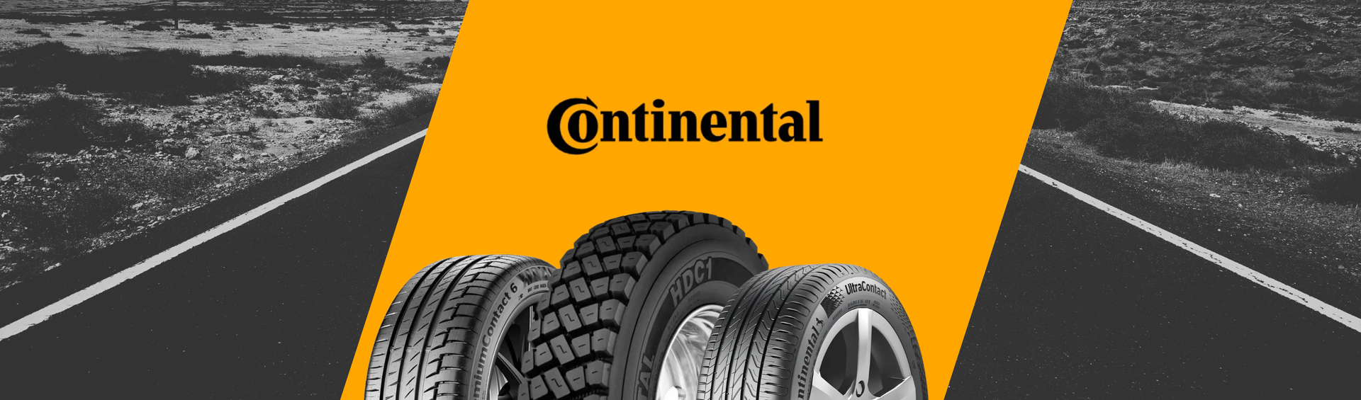 Uma loja de pneus continental com um carro estacionado em frente.