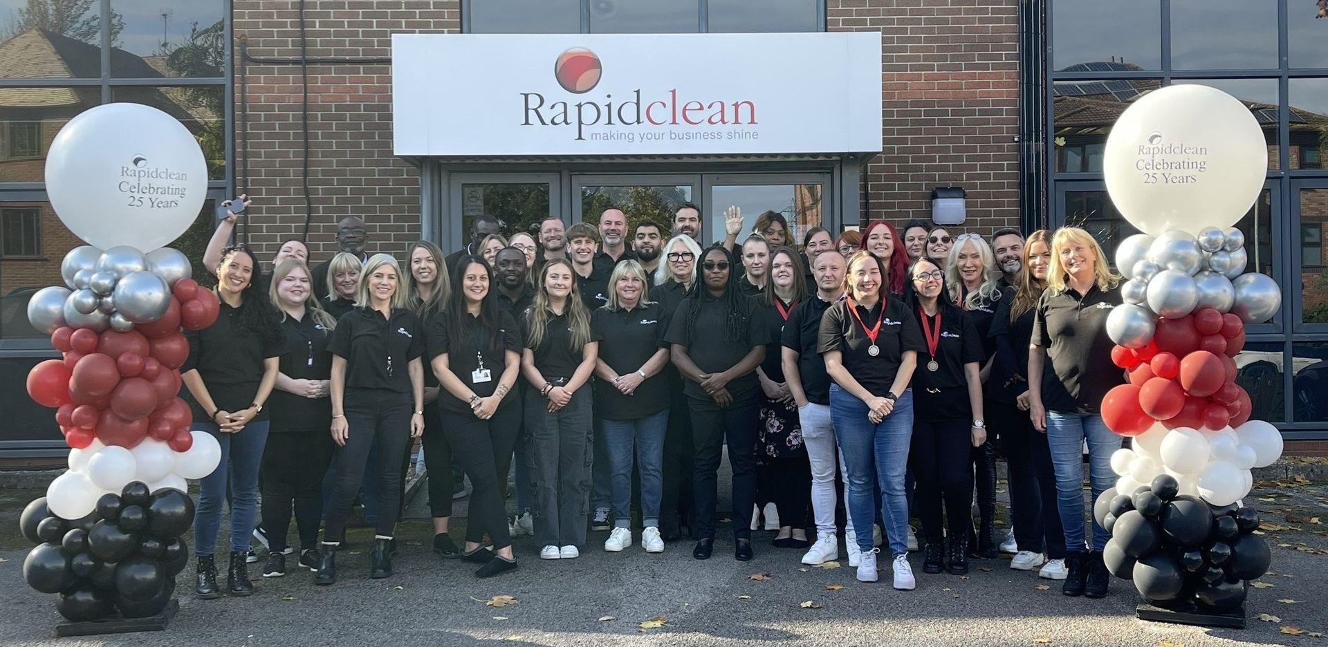 Rapid Clean team gathered outside office building in Wokingham, Berkshire