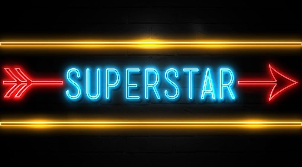 Superstar in blue writing