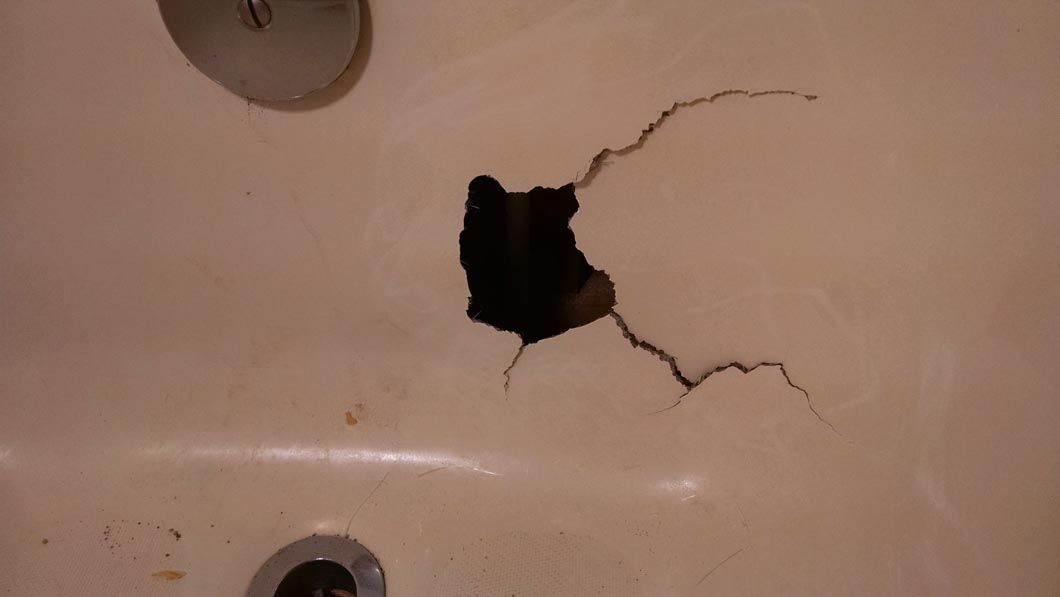 Before - Cracked Bathtub
