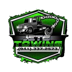 Logo for Jets Towing featuring a tow truck and phone number.