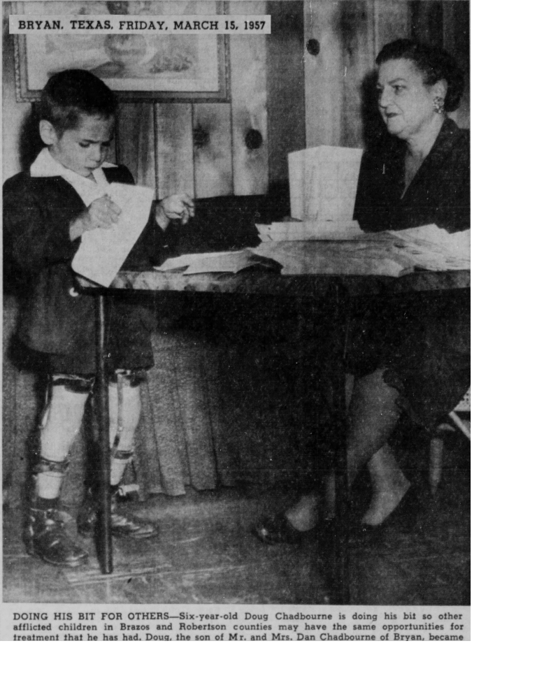 Boy shows papers to woman at desk, Bryan, Texas, 1957.