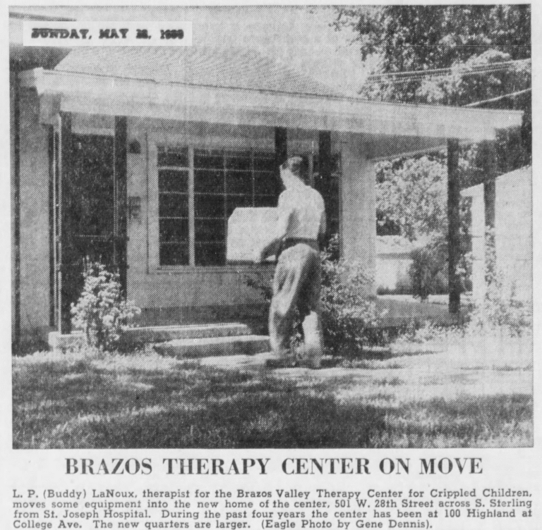Man moves equipment into new Brazos Therapy Center. Old building with a porch.