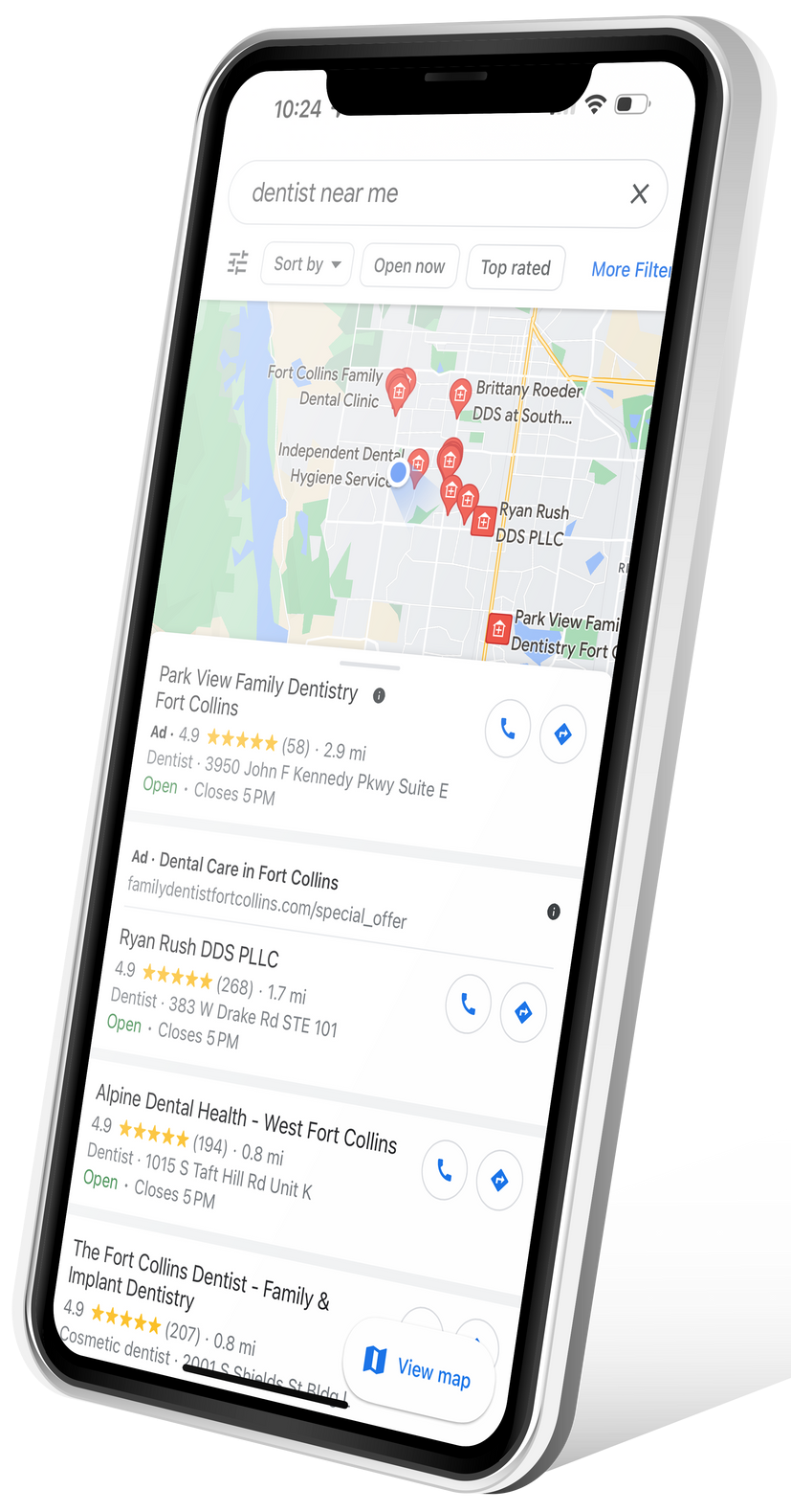 A cell phone with a map on the screen.