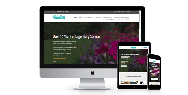 A computer monitor a tablet and a cell phone are displaying a website.