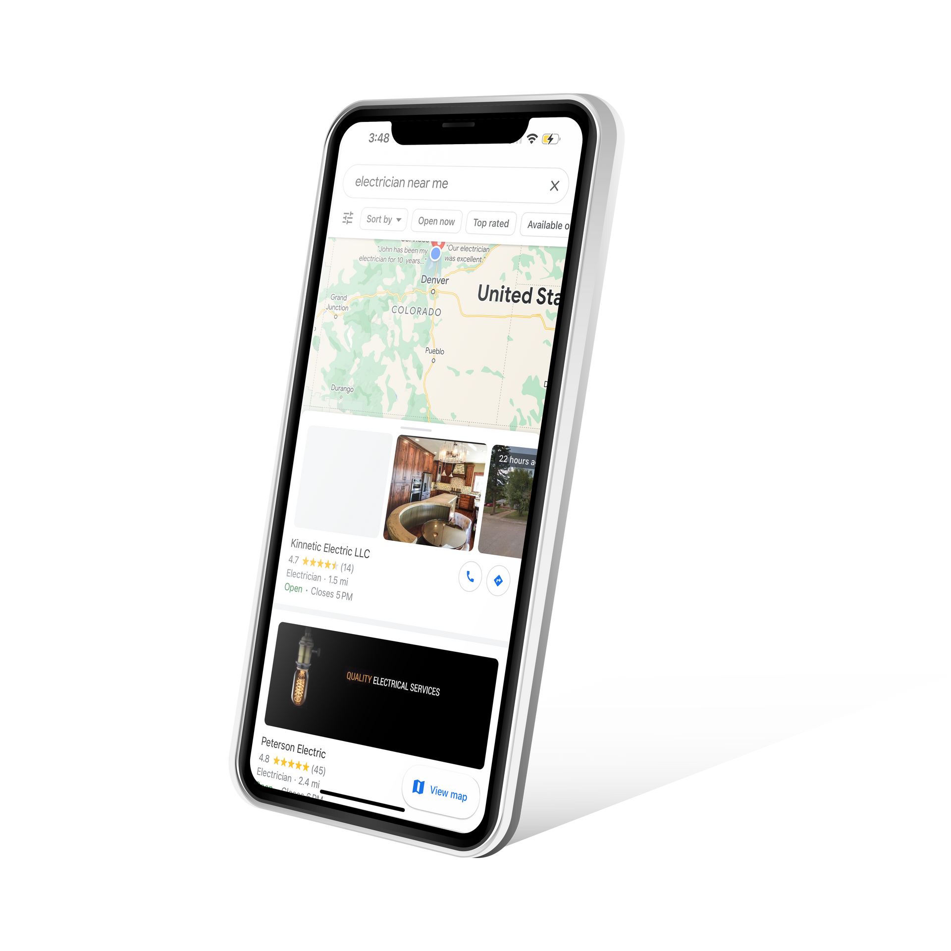 A cell phone with a google maps app on it.