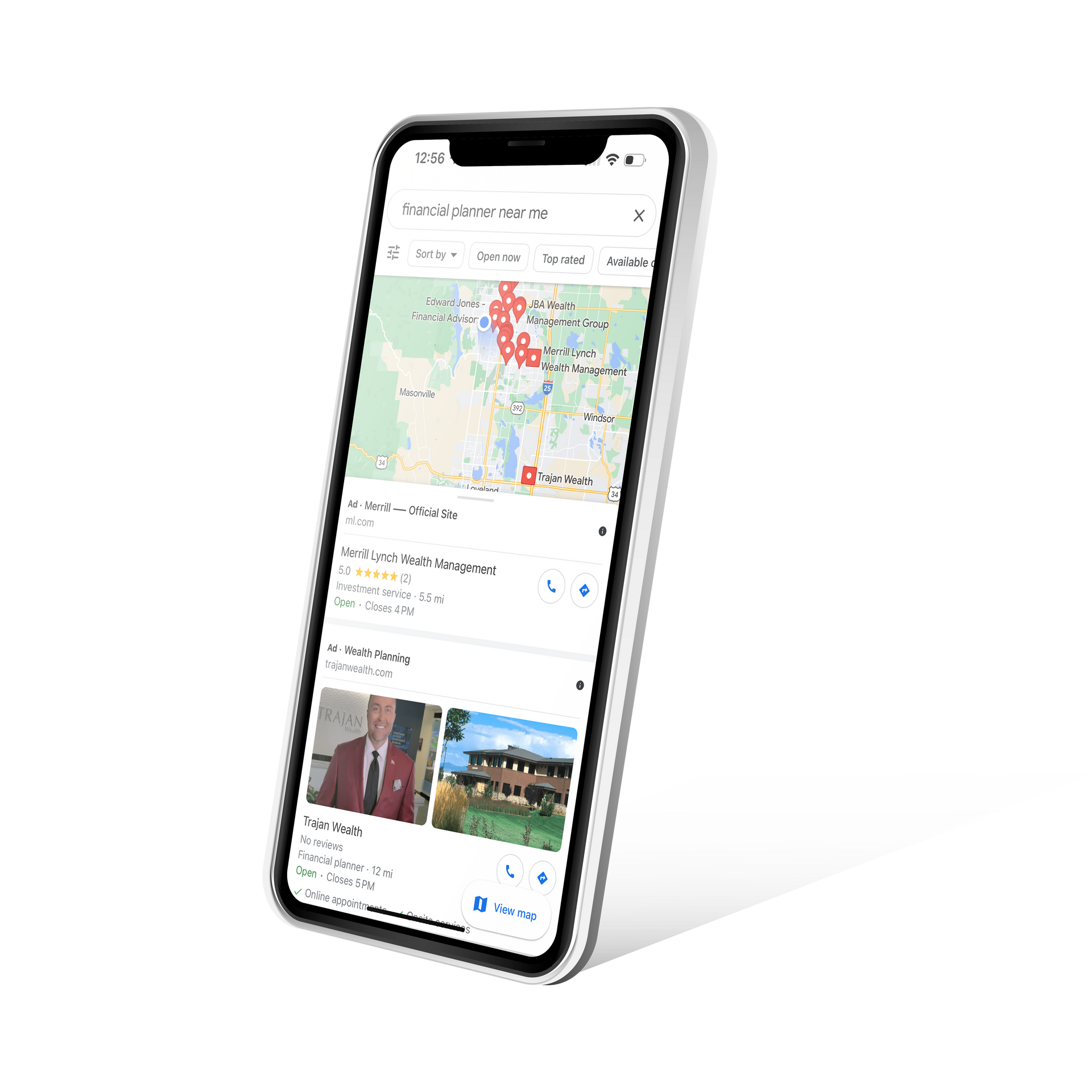 A cell phone is displaying a google map on its screen.