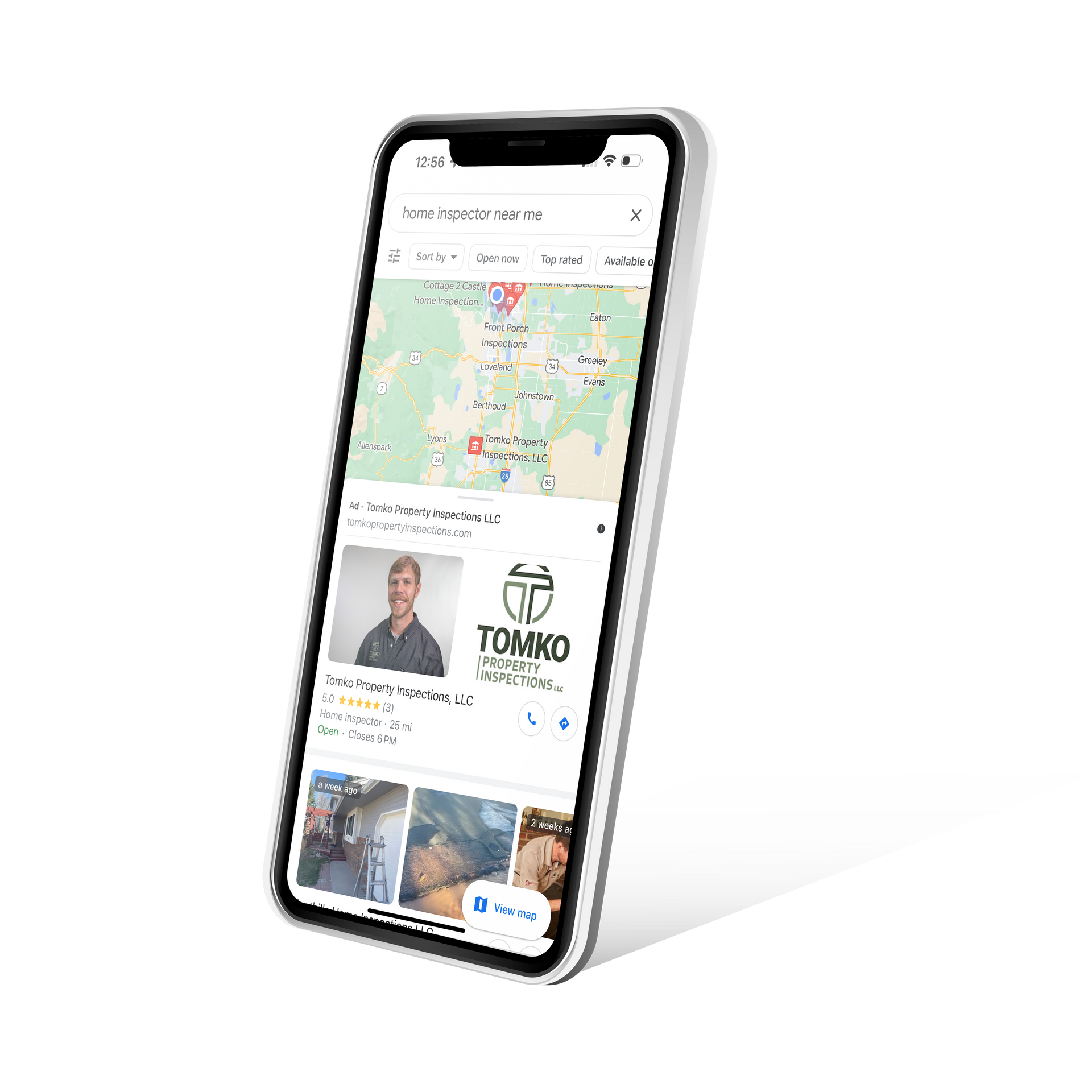 A cell phone is displaying a google map on its screen.