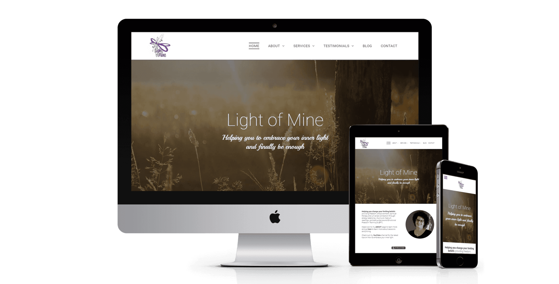 A computer , tablet , and cell phone are displaying a website called light of wine.