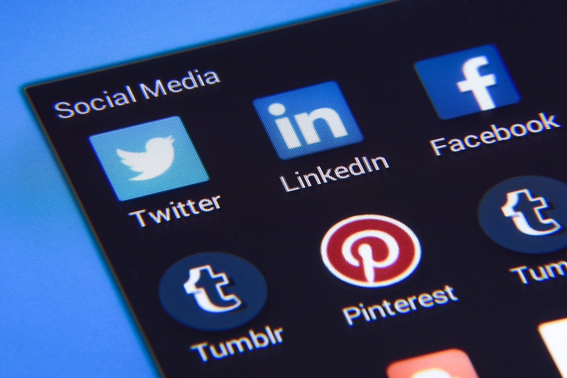 A close up of social media icons on a phone