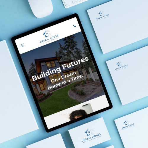 A tablet is sitting on top of a blue table next to a mouse.