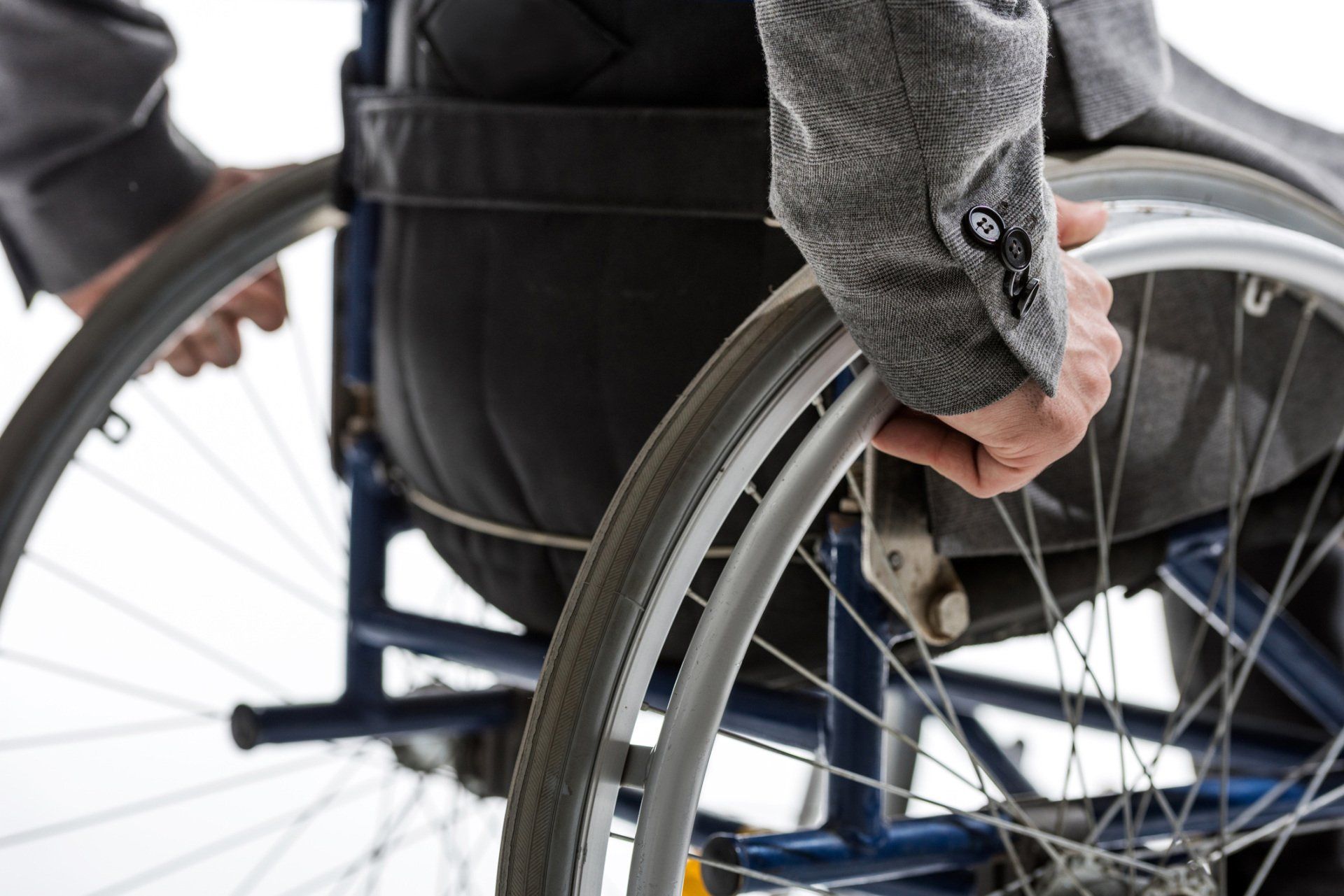 Man on Wheelchair — Peoria, IL — Robert Cottingham Property Management Co