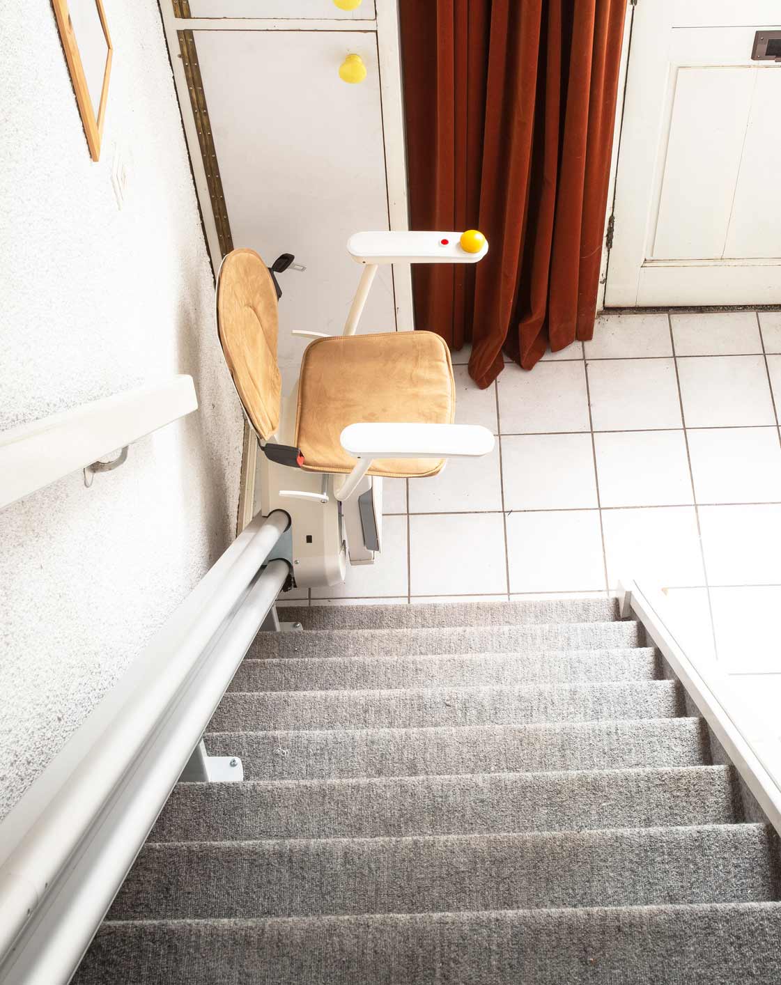 Automatic Stair Lift Of An Apartment — Peoria, IL — Robert Cottingham Property Management Co