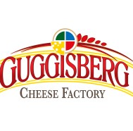The logo for guggisberg cheese factory is a cheese factory logo.