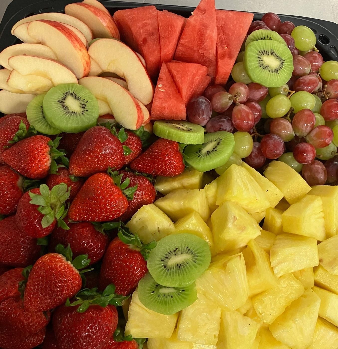 There are many different types of fruit on the table.