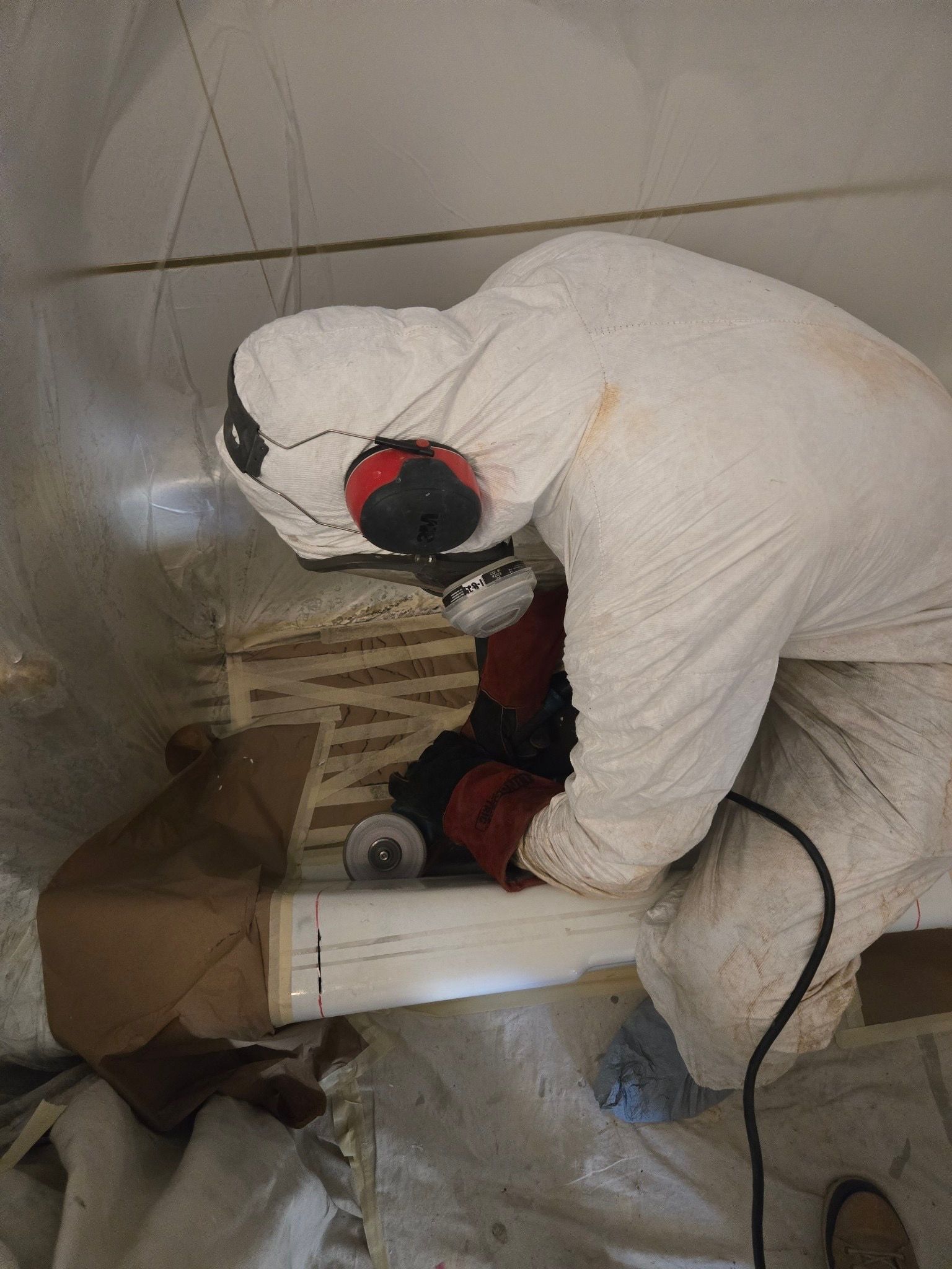 A bathroom with a bathtub and a walk in shower.