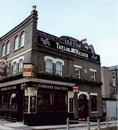 A brick building with a sign that says taylor walker