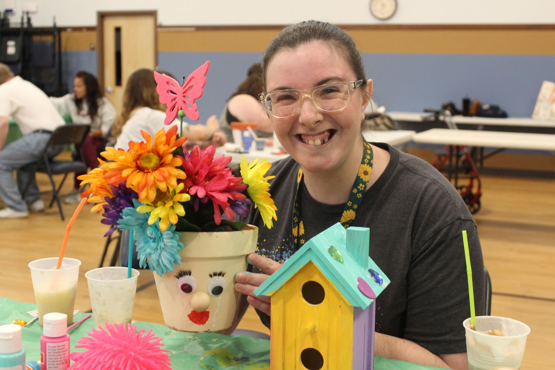 A young girl concentrates as she paints an owl at a Rec Night