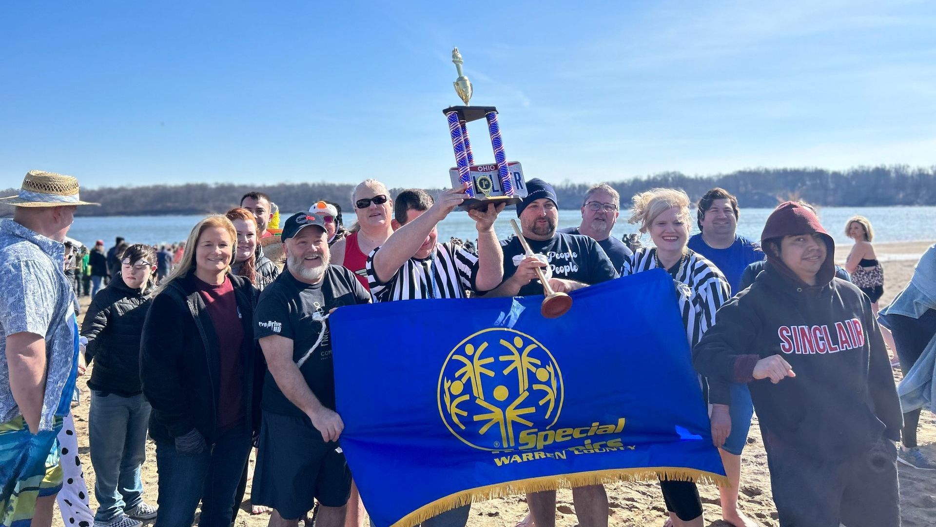 WCBDD Superintendent, Megan Manuel (left), and the Warren County Wildcats basketball team served as top fundraisers at last year's Caesar Creek Polar Plunge