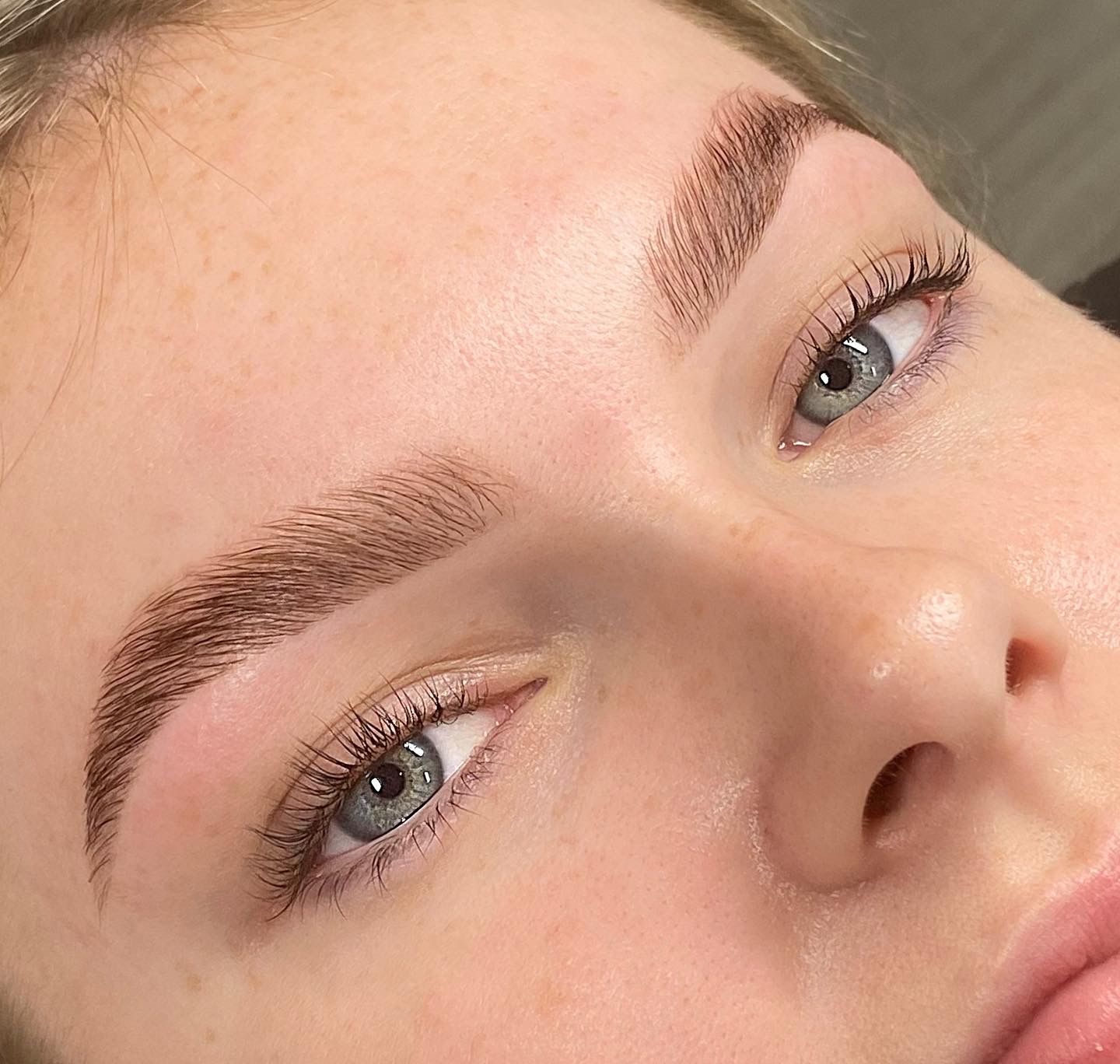 A Barber Chair Is Sitting In A Room Next To A Mirror — Bloom Skin Brows & Beauty In Bungalow, QLD