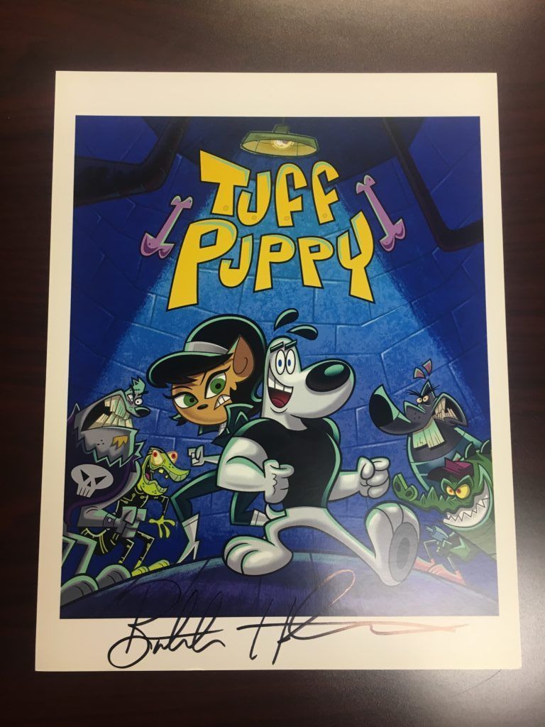A Tuff Puppy poster signed by Butch Hartman.