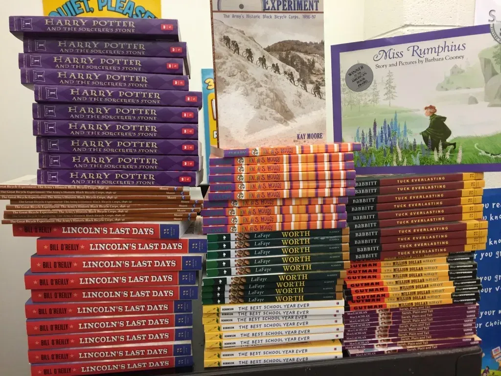 A stack of various books.