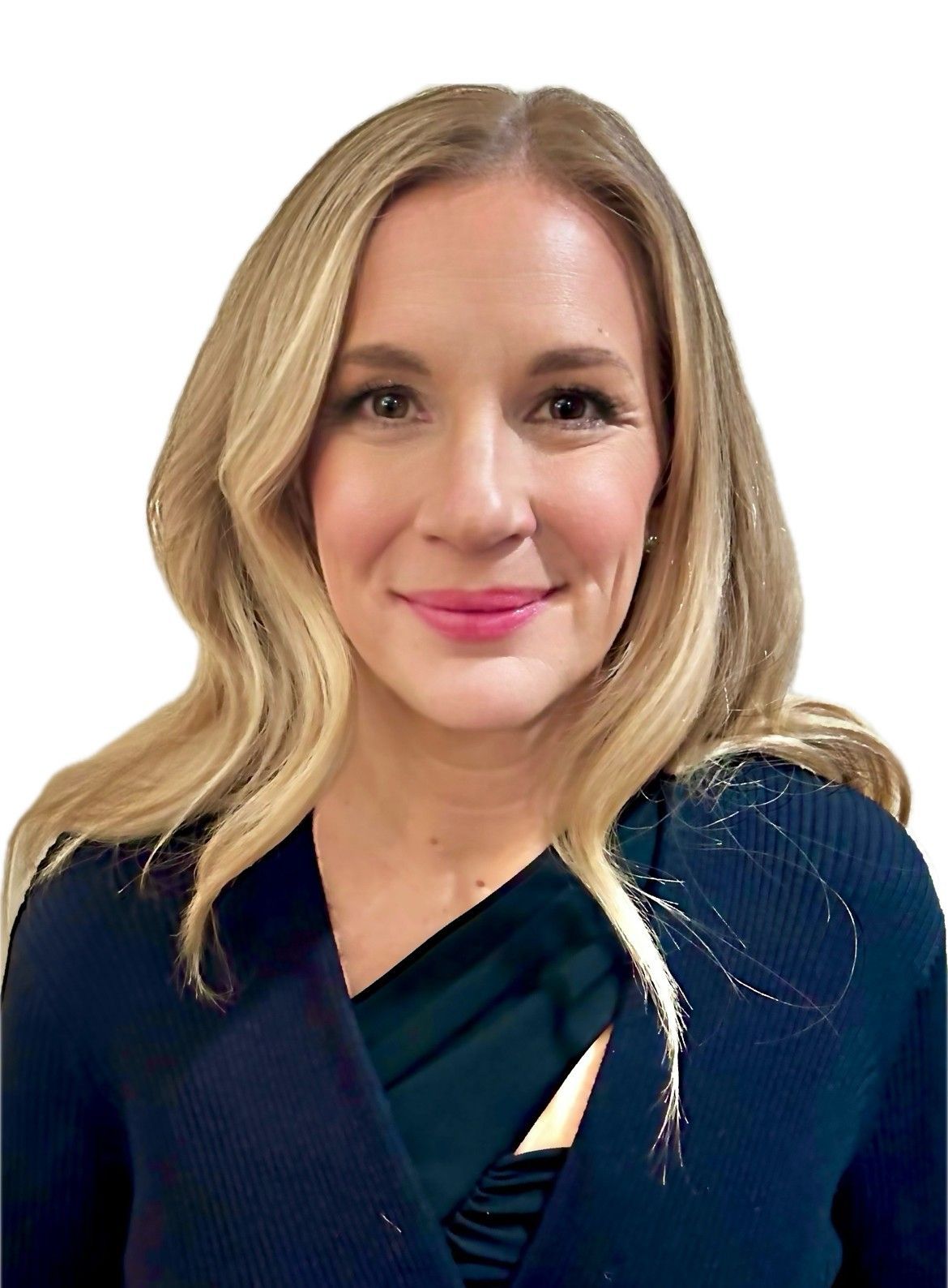 A woman with blonde hair is wearing a blue sweater and smiling.