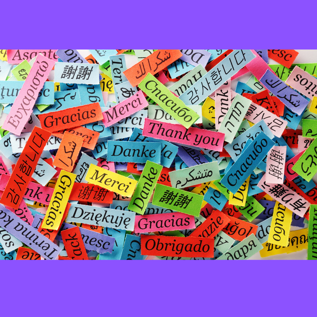 A pile of colorful thank you stickers in different languages.