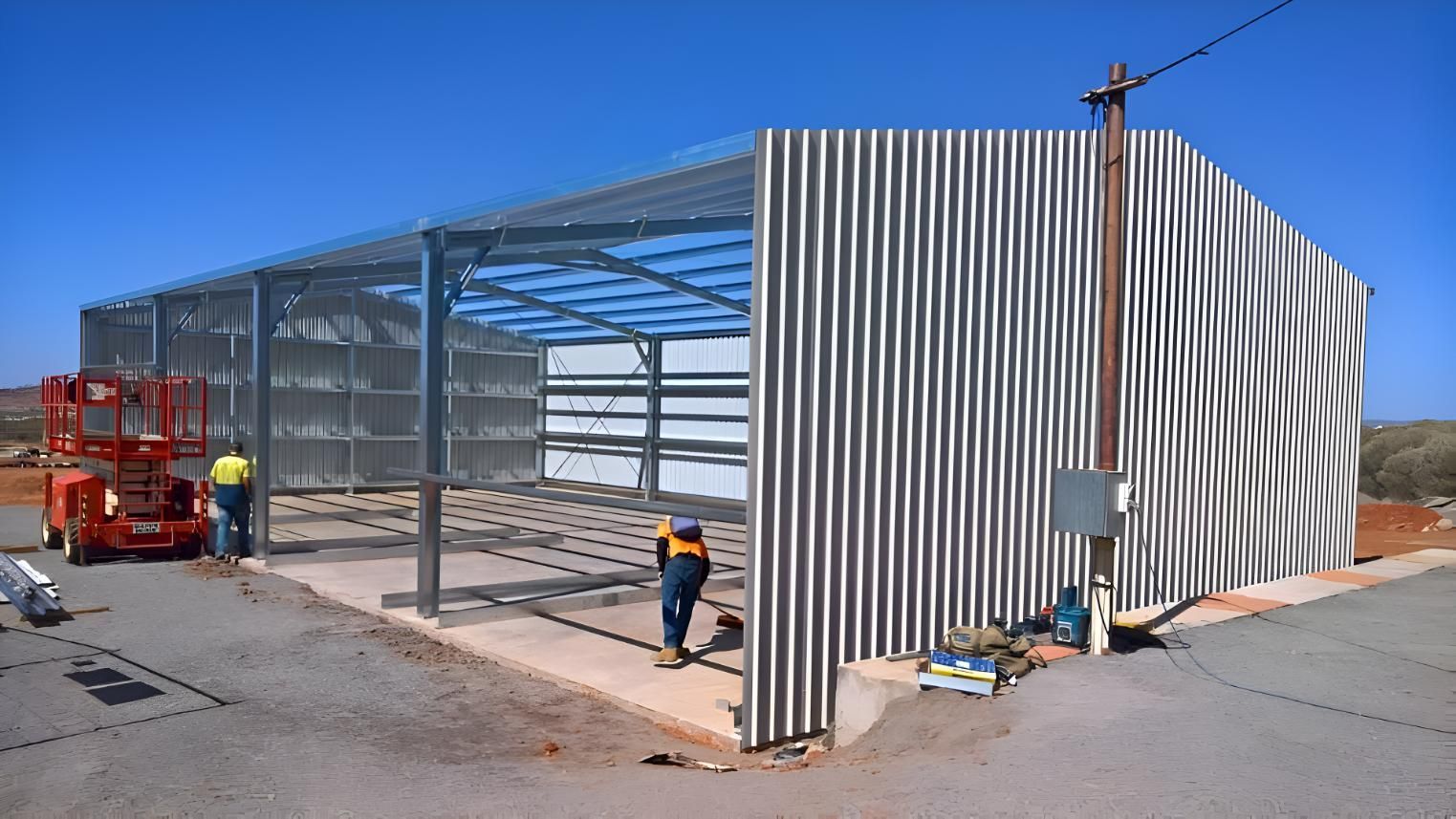A House With A Carport In Front Of It — Alice Sheds & Structures In Ciccone, NT