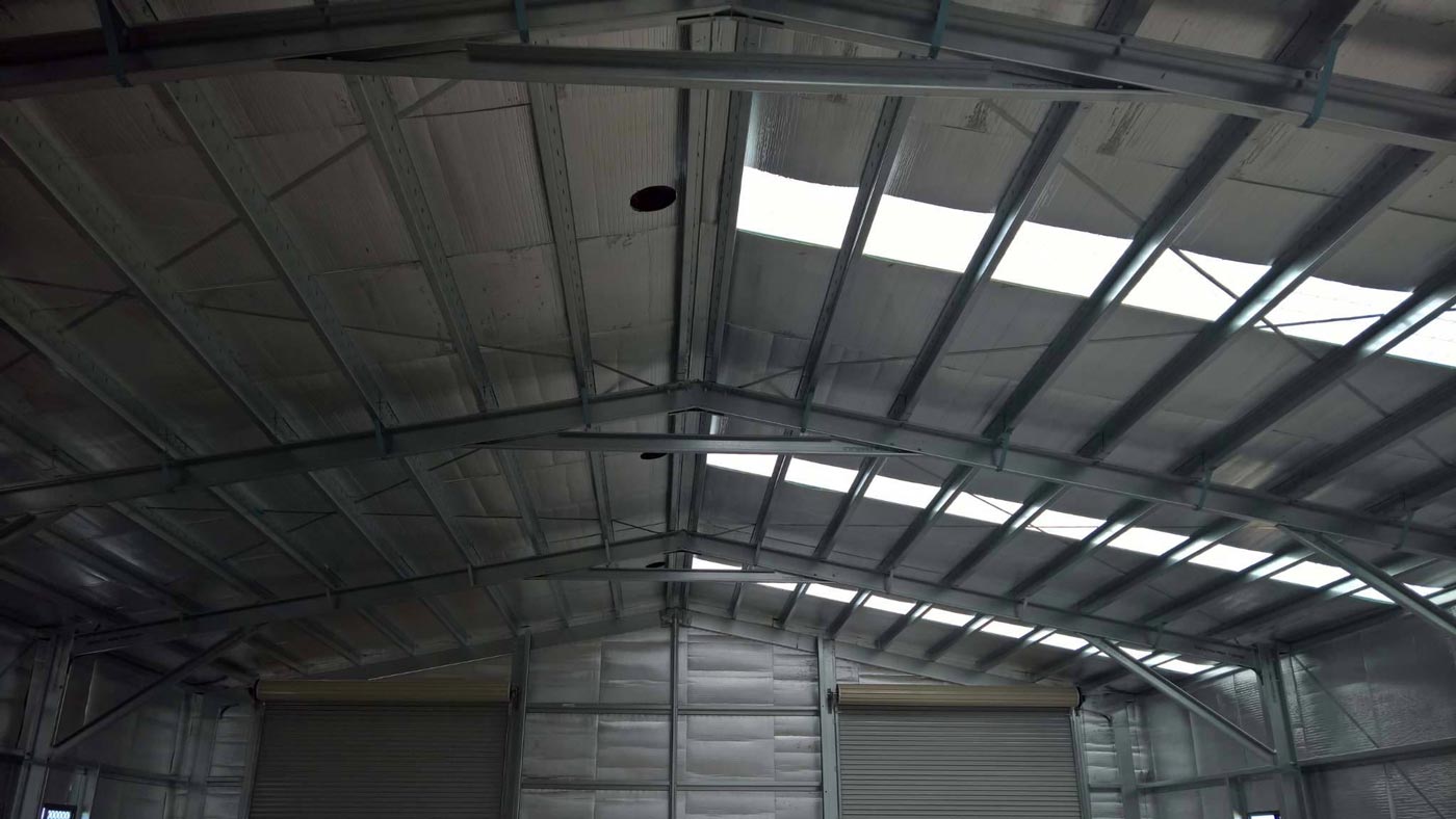 The Inside Of A Building With A Roof That Has A Lot Of Windows — Alice Sheds & Structures In Ciccone, NT