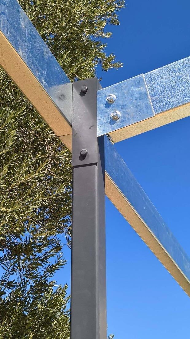 A Close Up Of A Metal Pole With A Tree In The Background — Alice Sheds & Structures In Ciccone, NT