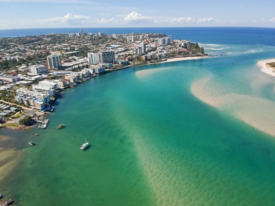 An Aerial View Of A Body Of Water With A City In The Background — Coastal Auto Doors & Gates In Nambour, QLD