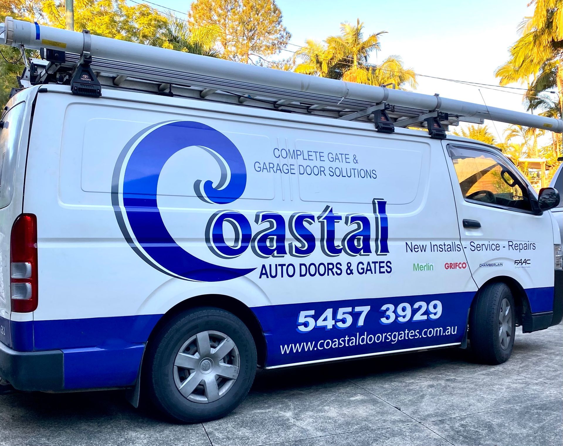 White Van With Blue Coastal Auto Doors & Gates Logo — Coastal Auto Doors & Gates In Palmwoods, QLD