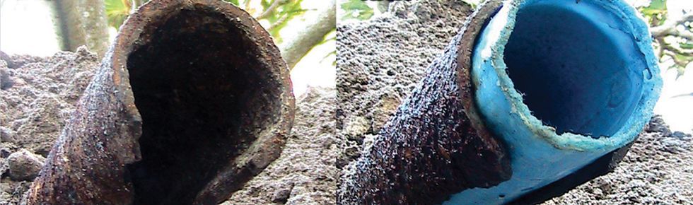 A close up of a blue pipe next to a close up of a black pipe.