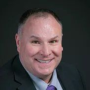 Travis M. Kunz