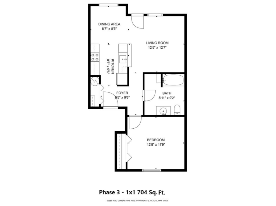 Floor plan of a 1-bedroom, 1-bath apartment, labeled with room dimensions and kitchen layout.