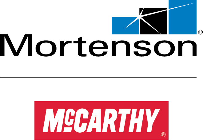Mortenson logo above McCarthy logo; both construction companies. Mortenson logo blue, black, white; McCarthy logo red, white.