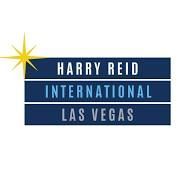 Harry Reid International Airport logo with blue rectangles and gold star.